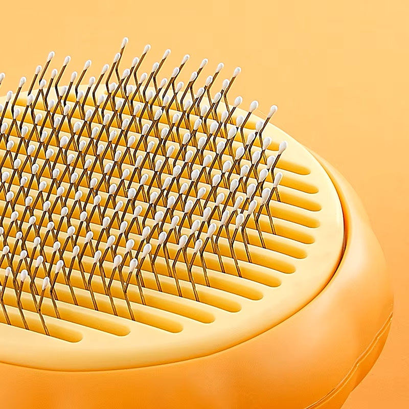 The FluffFlicker Grooming Brush™